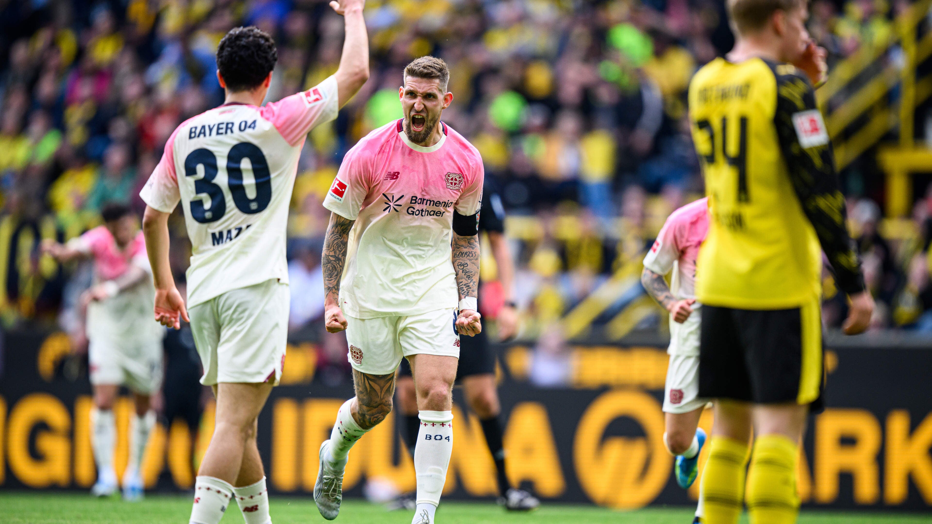 Borussia Dortmund verspeelt dure punten in jacht op koploper Bayern München