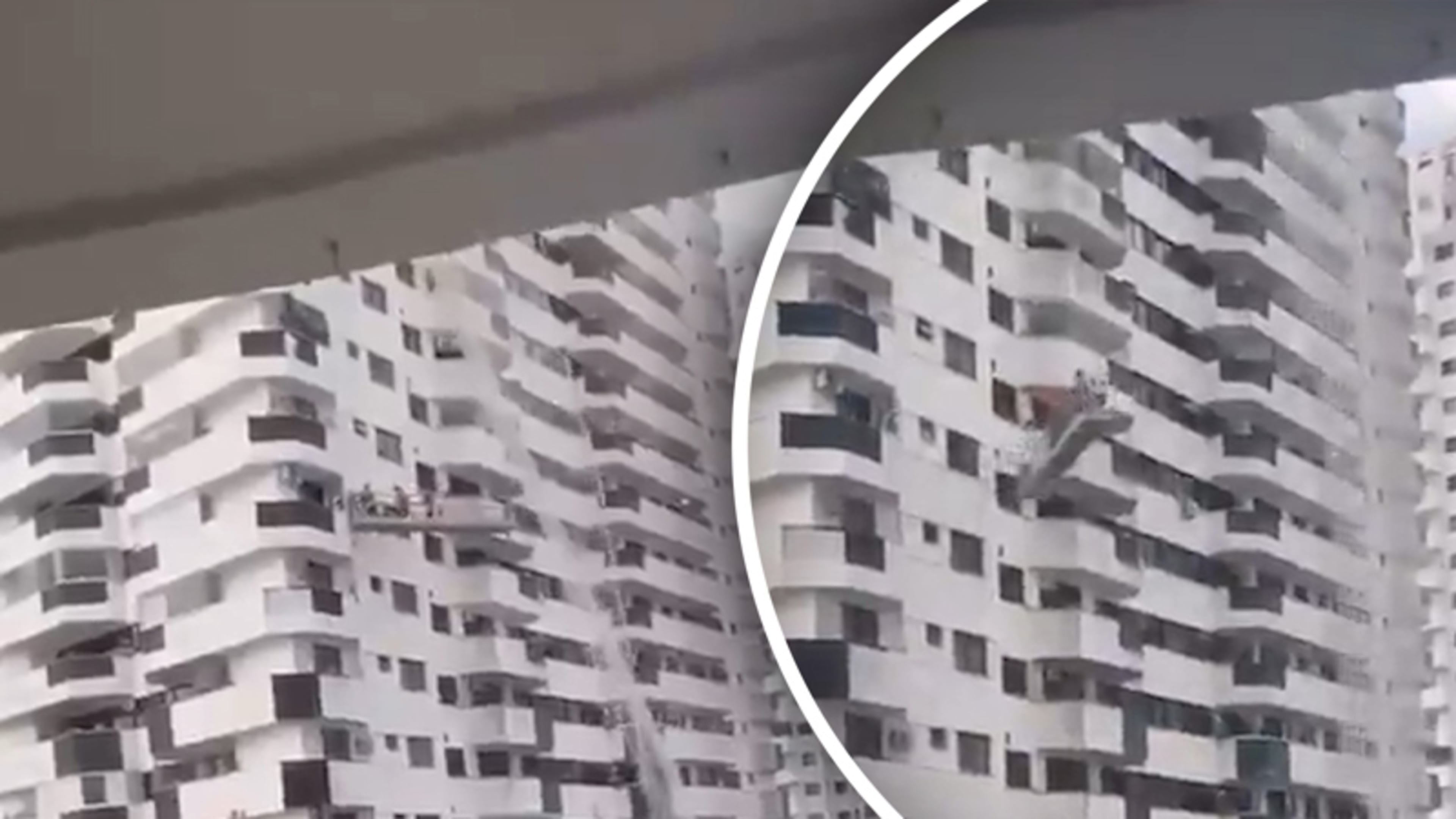 Schilders bungelen heen en weer in gondel tijdens storm in Brazilië