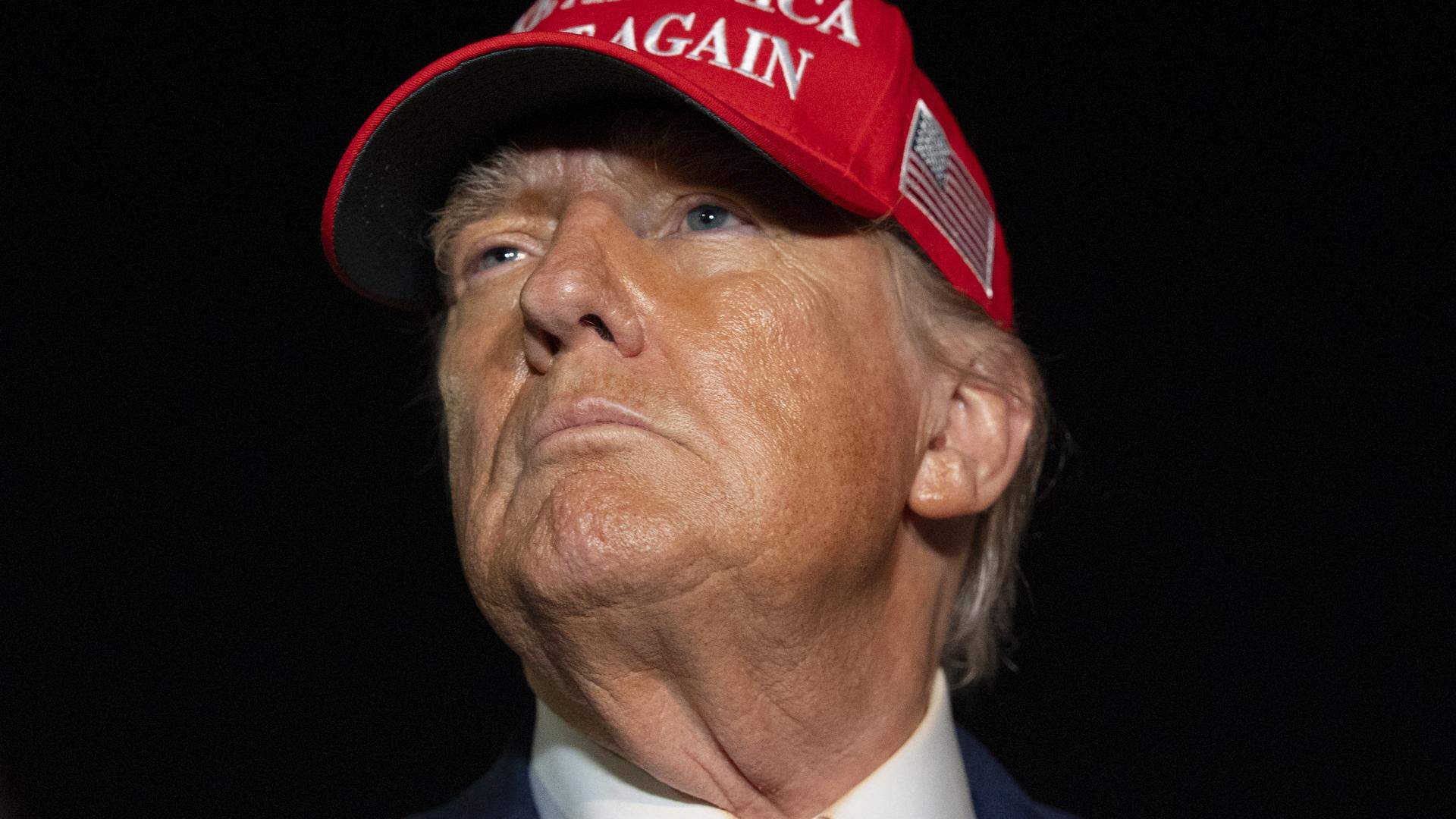 President Donald Trump speaks with reporters as he arrives on Air Force One, Friday, July 4, 2025, at Joint Base Andrews, Md. (AP Photo/Alex Brandon)