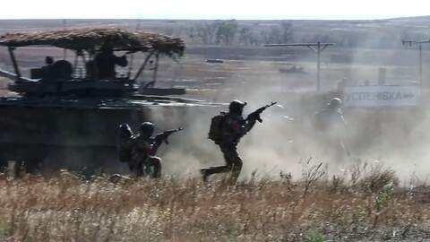 In this image made from video provided by the Russian Defense Ministry Press Service on Friday, Oct. 31, 2025, Russian servicemen attend a practice for sabotage operations behind enemy lines at a training ground on an undisclosed location. (Russian Defense Ministry Press Service via AP)