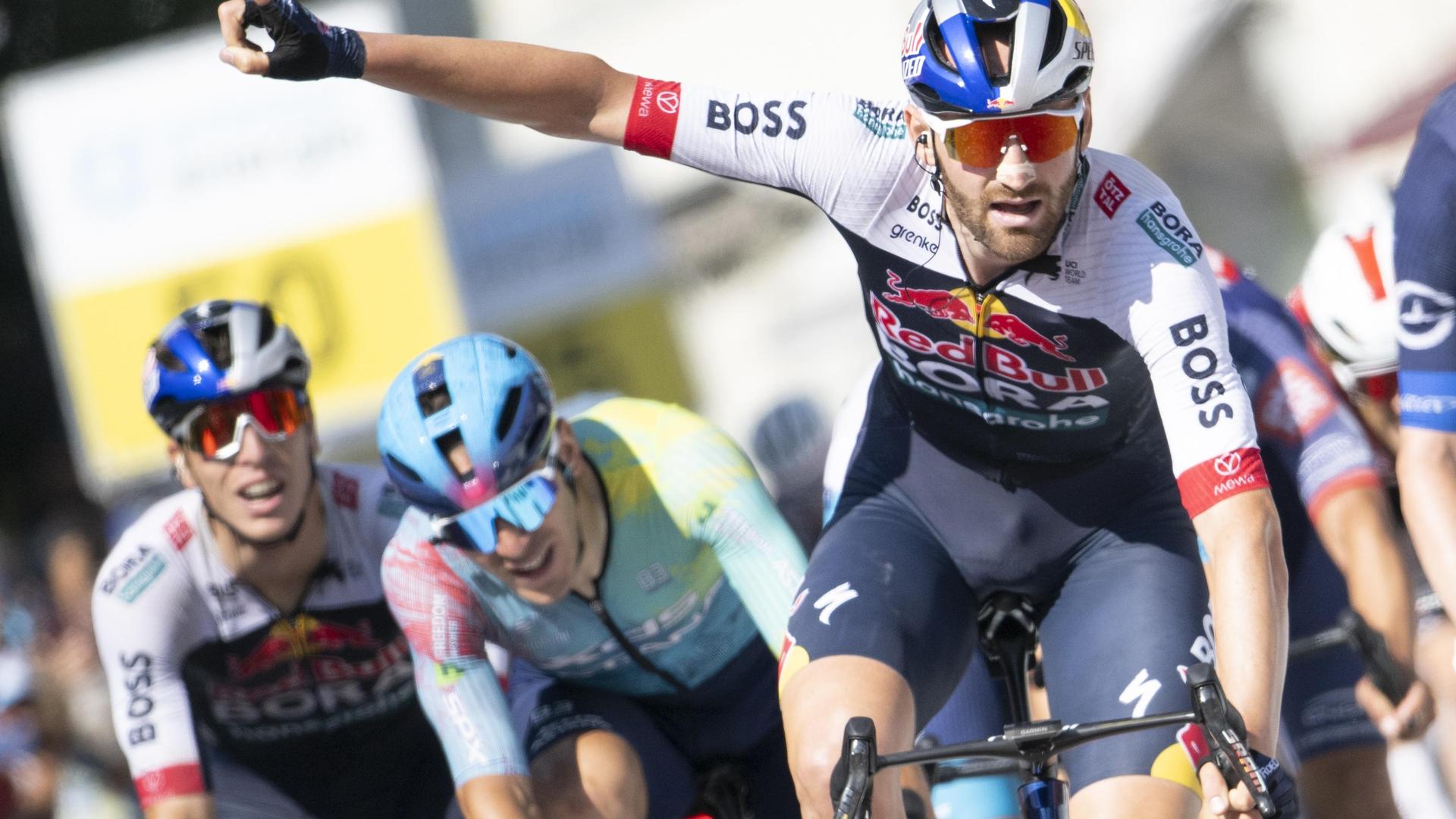 epa12187607 Belgian rider Jordi Meeus of Red Bull - BORA - hansgrohe wins the sixth stage of the Tour de Suisse cycling race, over 186.7km from Chur to Neuhausen am Rheinfall, Switzerland, 20 June 2025.  EPA/GIAN EHRENZELLER