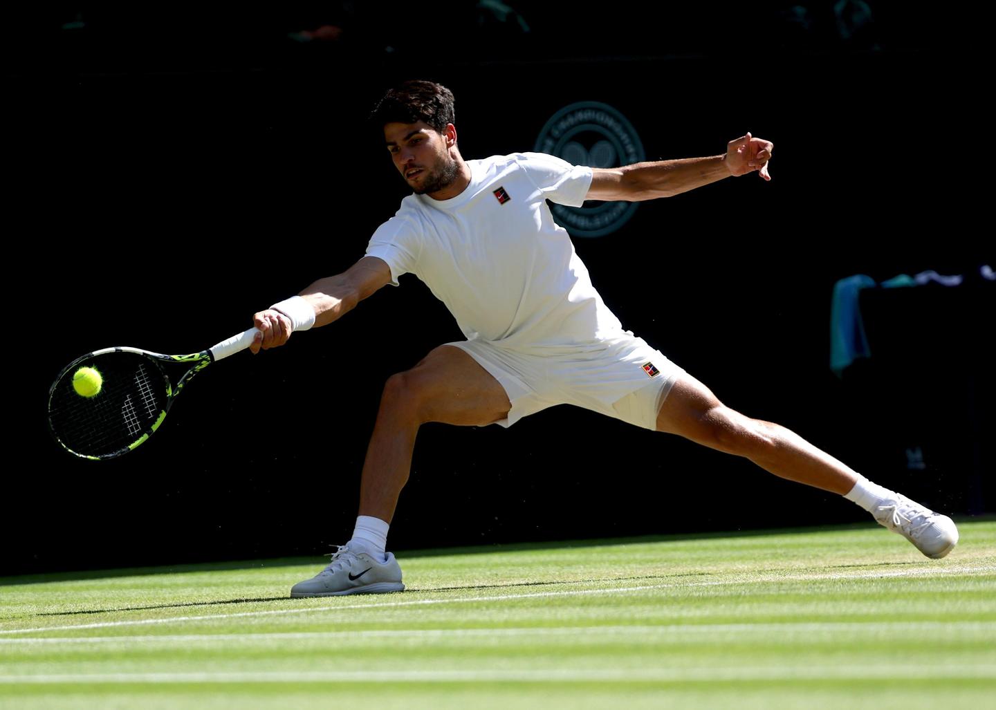 Carlos Alcaraz in actie tegen Taylor Fritz.