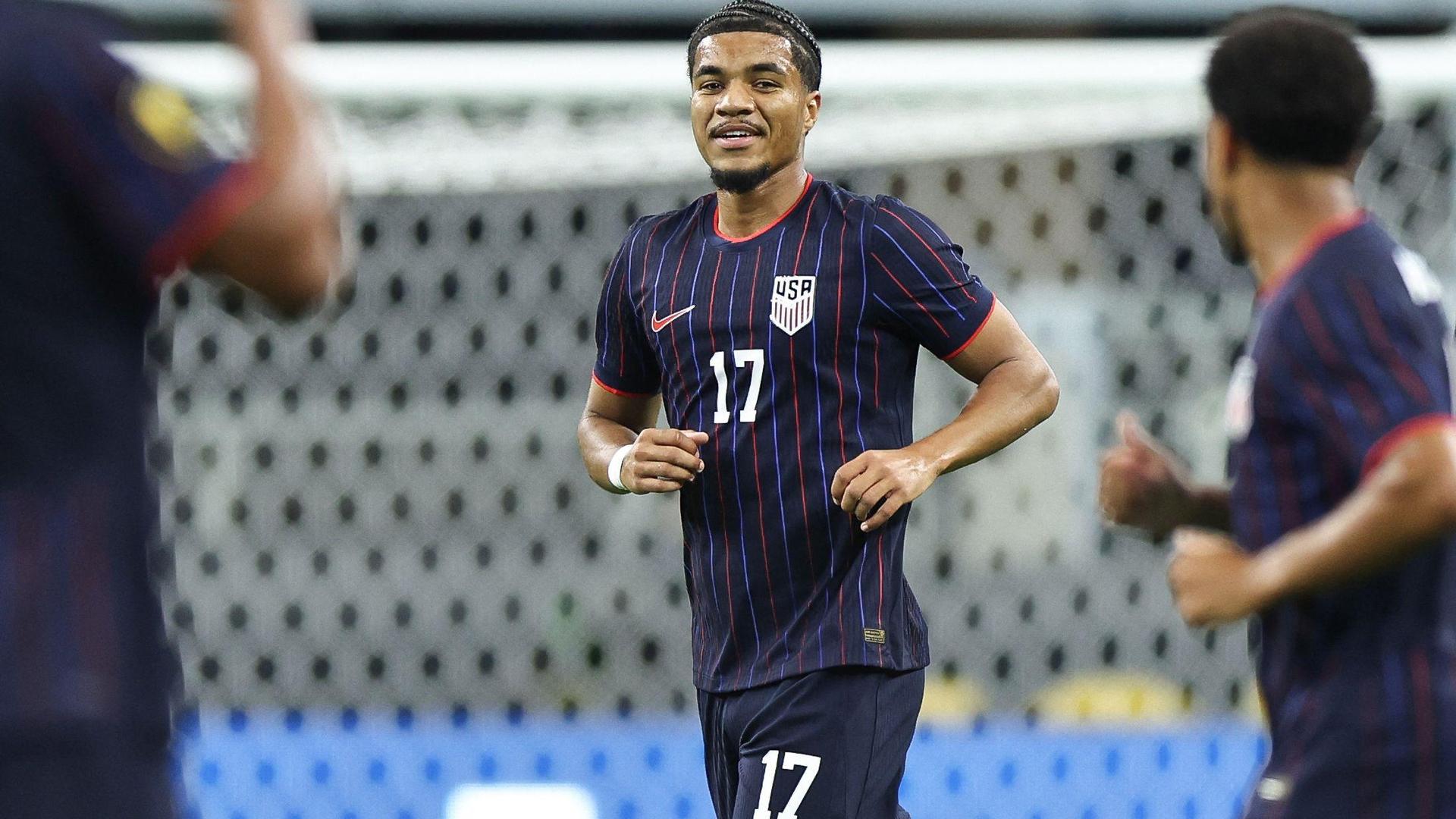 ARLINGTON, TEXAS - JUNE 22: Malik Tillman #17 of United States celebrates after scoring his teammates first goal during the Group Stage - Group D match between United States and Haiti as part of the 2025 CONCACAF Gold Cup at AT&T Stadium on June 22, 2025 in Arlington, Texas.   Omar Vega/Getty Images/AFP (Photo by Omar Vega / GETTY IMAGES NORTH AMERICA / Getty Images via AFP)