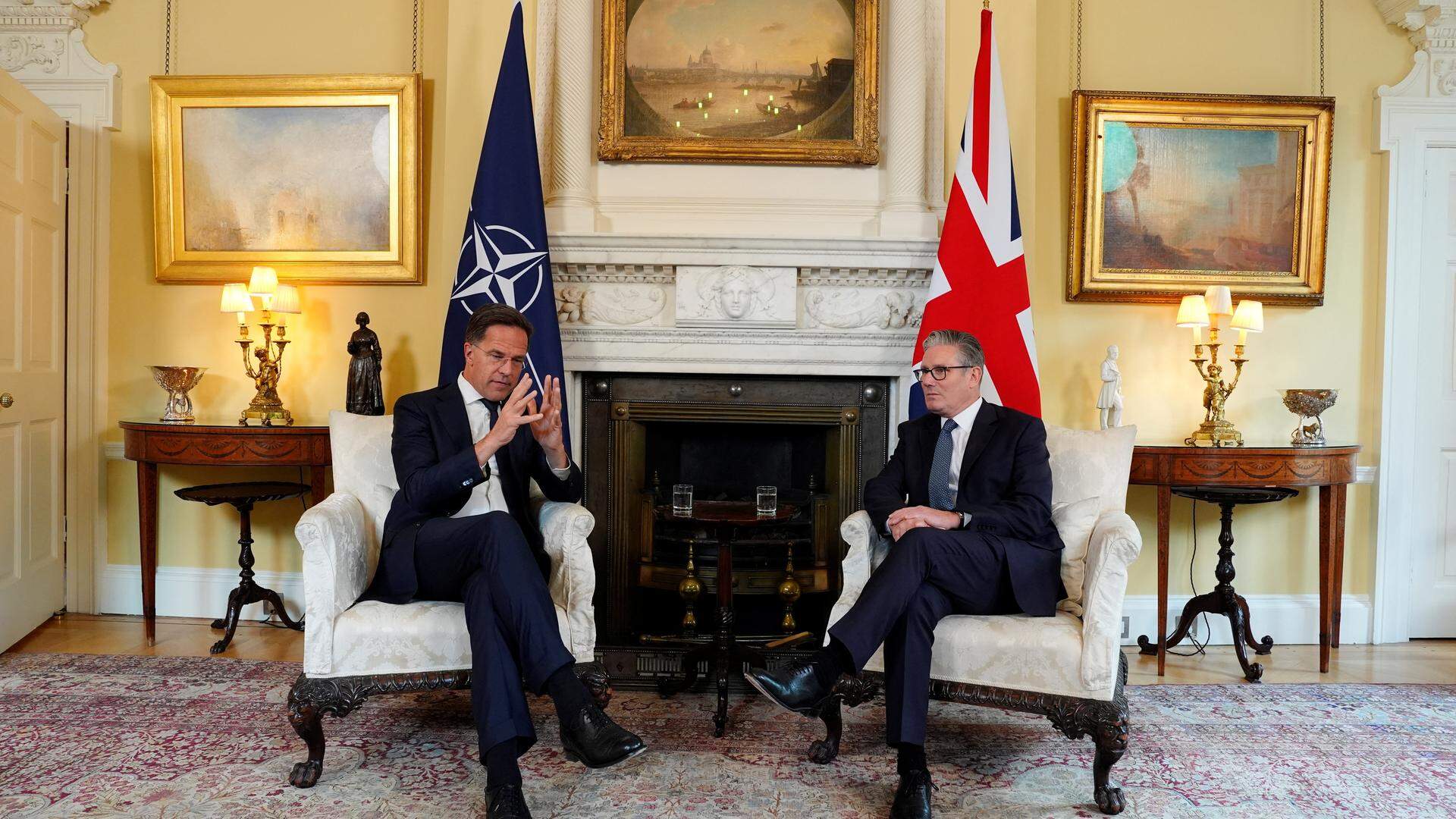 Britain's Prime Minister Keir Starmer (R) speaks with NATO Secretary General Mark Rutte (L) during a bilateral meeting at 10 Downing Street, in central London, on June 9, 2025. NATO Secretary General Mark Rutte is due on June 9 to urge a "400-percent increase" in the transatlantic alliance's air and missile defence capacities in response to the threat from Russia. His comments come ahead of a NATO summit in the Netherlands this month where US President is pressuring alliance members to announce a major boost in their military budgets.
Jordan Pettitt / POOL / AFP